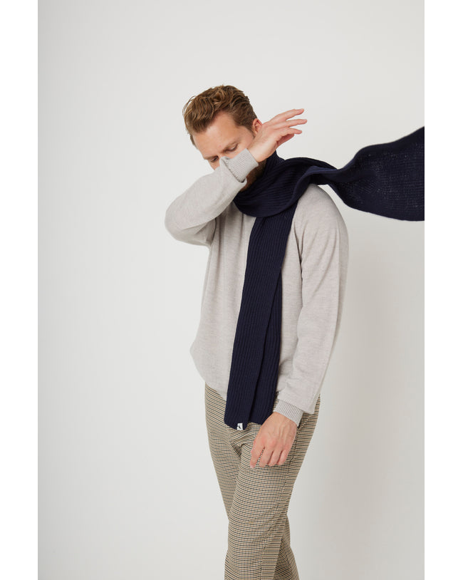 Image of model wearing Porter Ribbed Scarf. One Size