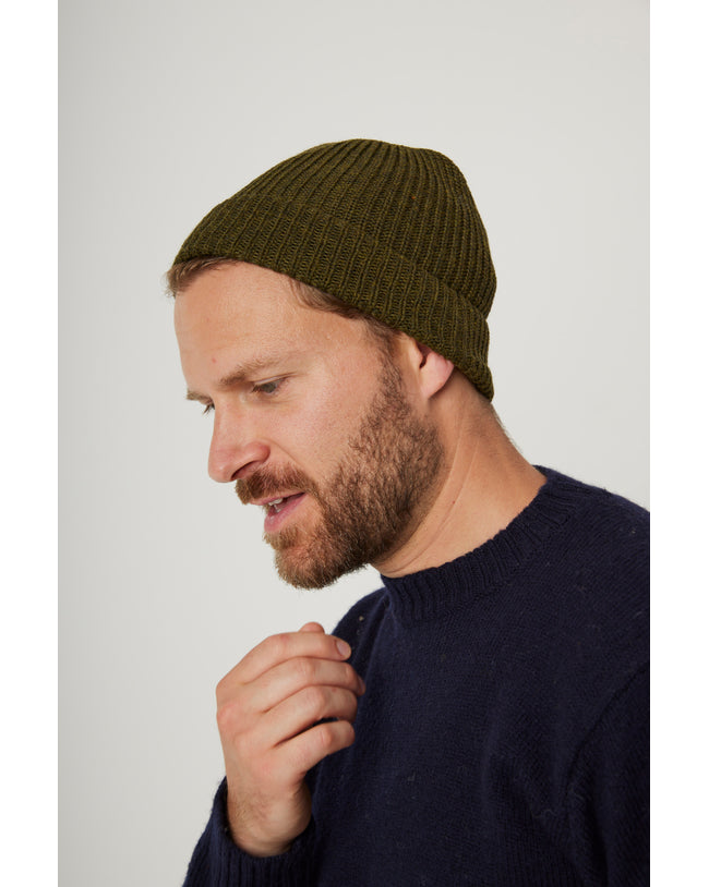 Image of model wearing Porter Ribbed Beanie. One Size