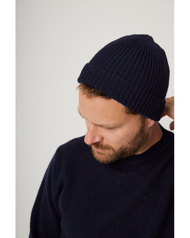 Image of model wearing Porter Ribbed Beanie. One Size