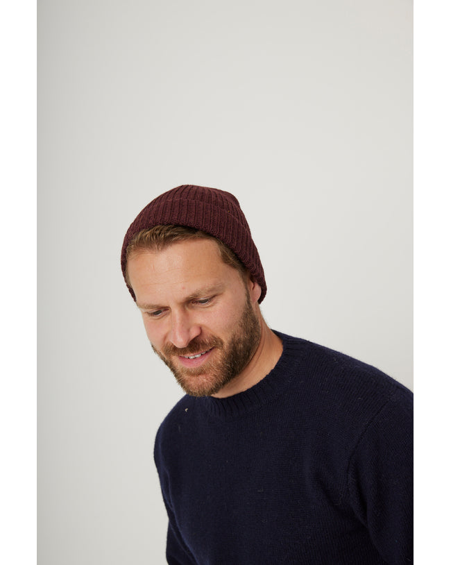 Image of model wearing Porter Ribbed Beanie. One Size