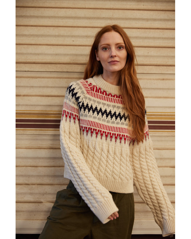 Image of model wearing Alpine Chalet Sweater. Model is 5ft8in, size UK 8 and wearing size Small