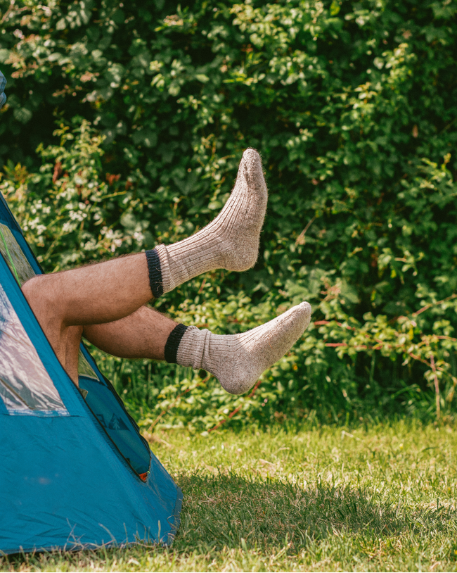 Image of model wearing Boot Socks. Small - UK4-7/ Large - UK 8-12