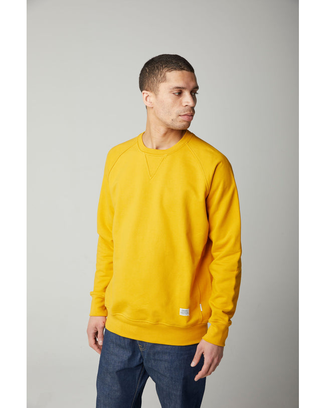 Image of model wearing Classic Sweatshirt. Model is 6ft, chest size 36in and wearing size Large