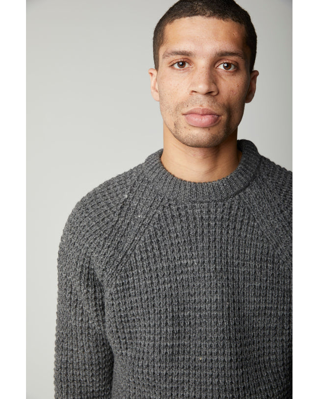Image of model wearing Waffle Crew Neck Jumper. Model is 6ft, chest size 36in and wearing size Medium