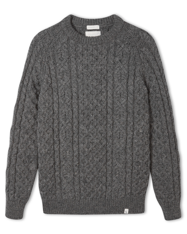 Image of model wearing Hudson Aran Jumper. Model is 6ft1in, chest size 38in and wearing size Medium