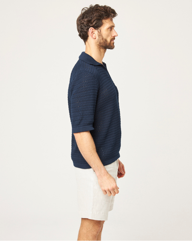Image of model wearing Island Crochet Polo Shirt.
