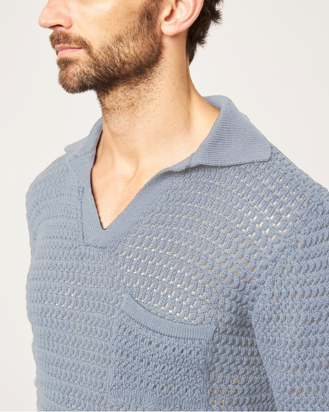 Image of model wearing Island Crochet Polo Shirt.