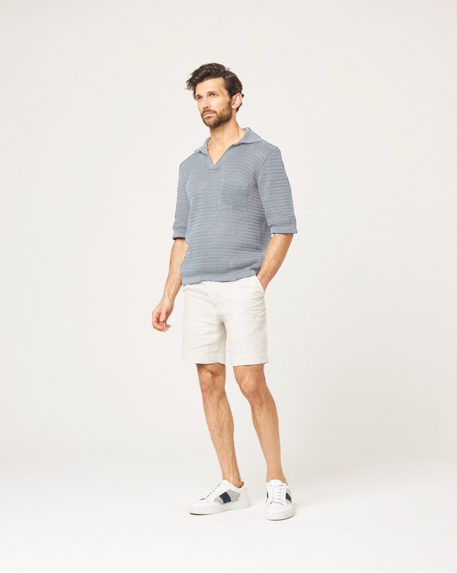 Image of model wearing Island Crochet Polo Shirt.