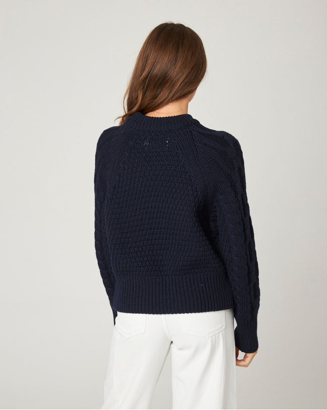 Image of model wearing Isobel Aran Jumper. Model is 5ft8, size UK 8 and wearing size Small