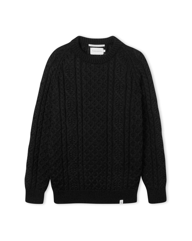 Image of model wearing Hudson Aran Jumper. Model is 6ft1in, chest size 38in and wearing size Medium