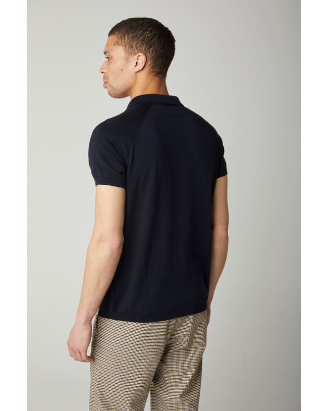 Image of model wearing Knitted Emery Polo Shirt. Model is 6ft, chest size 36in and wearing size Medium