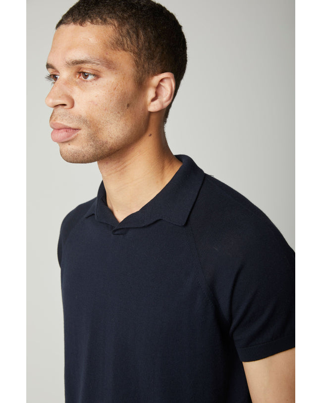 Image of model wearing Knitted Emery Polo Shirt. Model is 6ft, chest size 36in and wearing size Medium