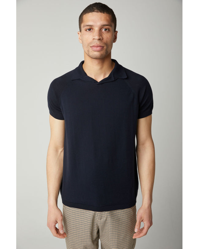 Image of model wearing Knitted Emery Polo Shirt. Model is 6ft, chest size 36in and wearing size Medium