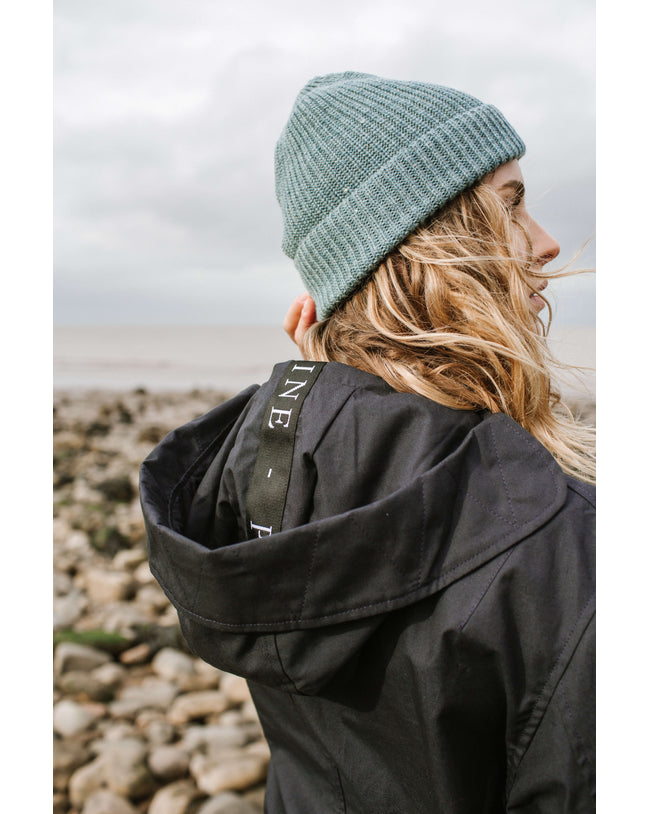 Image of model wearing Porter Ribbed Beanie. One Size