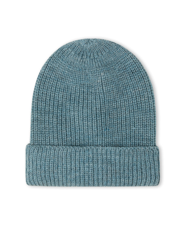 Image of model wearing Porter Ribbed Beanie. One Size