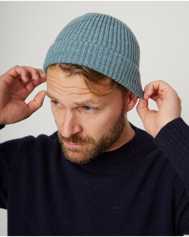 Image of model wearing Porter Ribbed Beanie. One Size