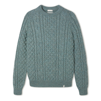 Image of model wearing Hudson Aran Jumper. Model is 6ft1in, chest size 40in and wearing size Large