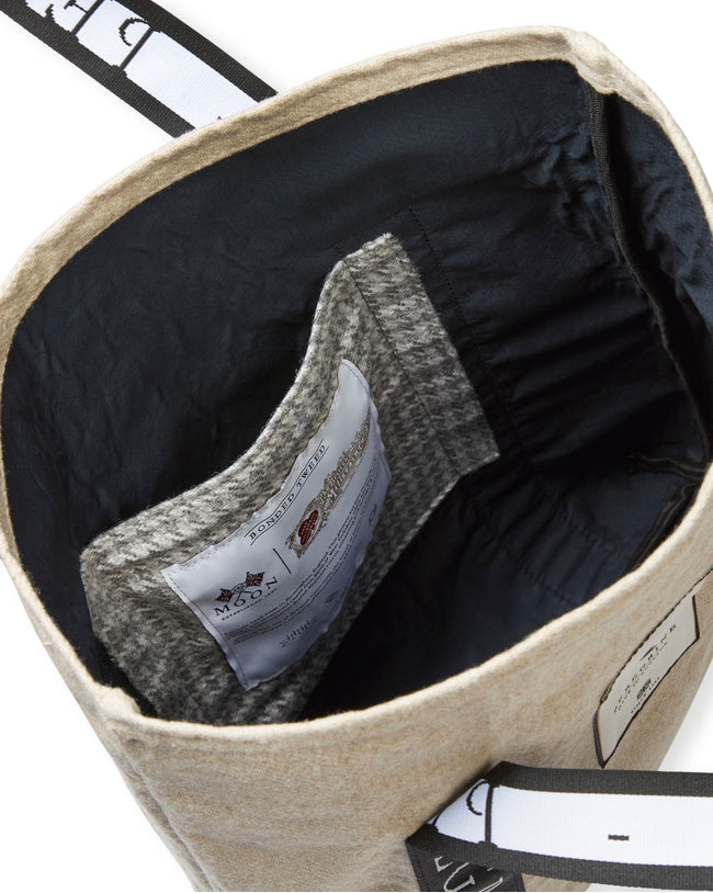 Image of model wearing Recycled Wool Tote Bag. One Size