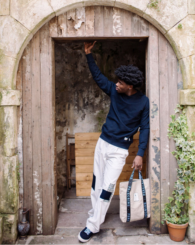 Image of model wearing Recycled Wool Tote Bag. One Size