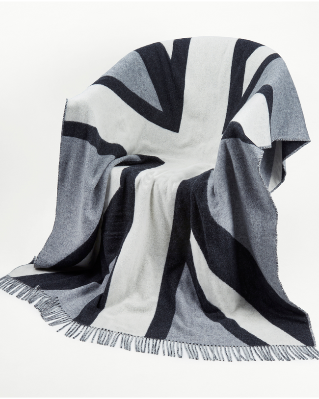 Image of model wearing Grey Union Jack Wool Blanket.