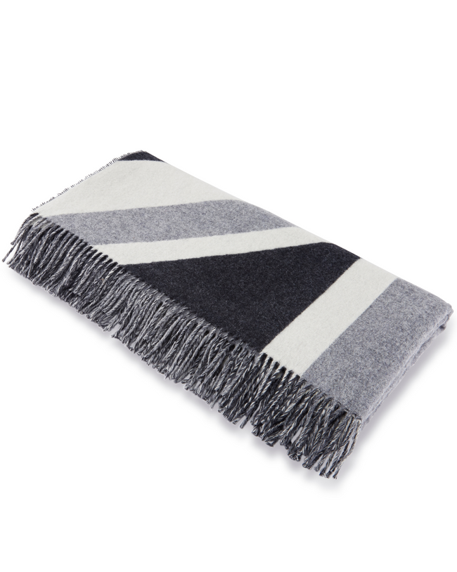 Image of model wearing Grey Union Jack Wool Blanket.