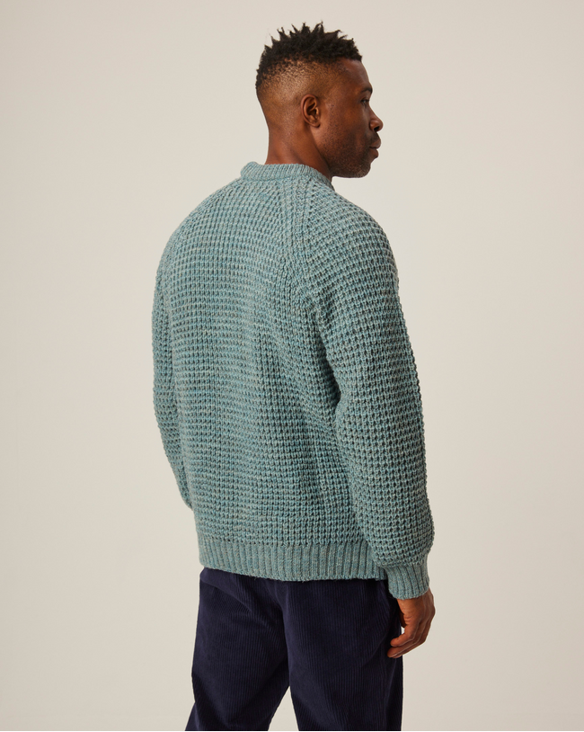 Image of model wearing Waffle Crew Neck Jumper. Model is 6ft1in, chest size 38in and wearing size Medium