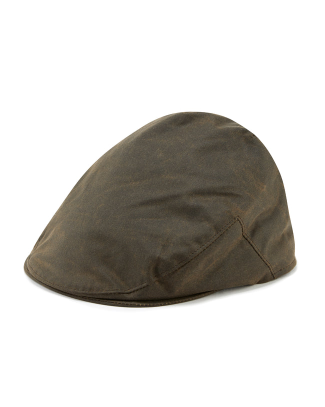 Image of model wearing Wax Flat Cap.