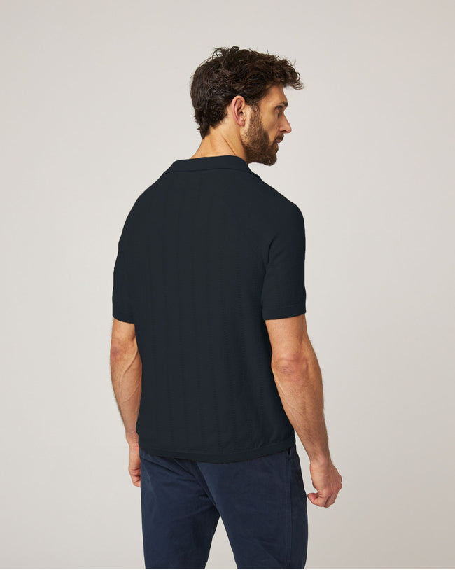 Image of model wearing Alma Polo shirt.