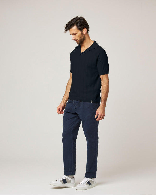 Image of model wearing Alma Polo shirt.