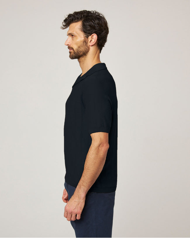 Image of model wearing Alma Polo shirt.
