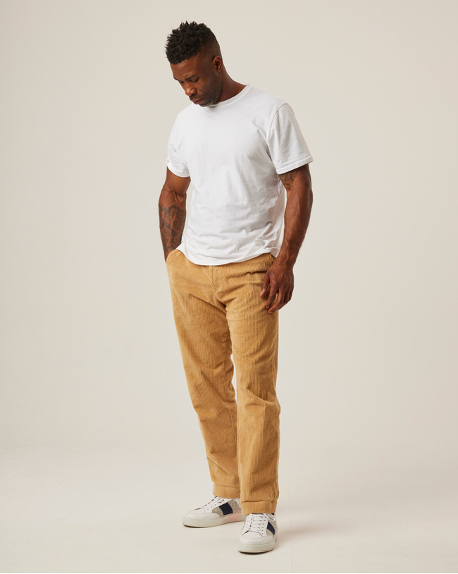 Image of model wearing Blake Corduroy Trousers.