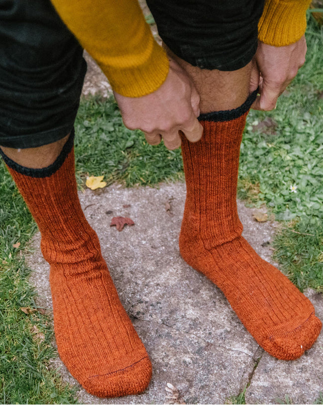 Image of model wearing Boot Socks. Small - UK4-7/ Large - UK 8-12