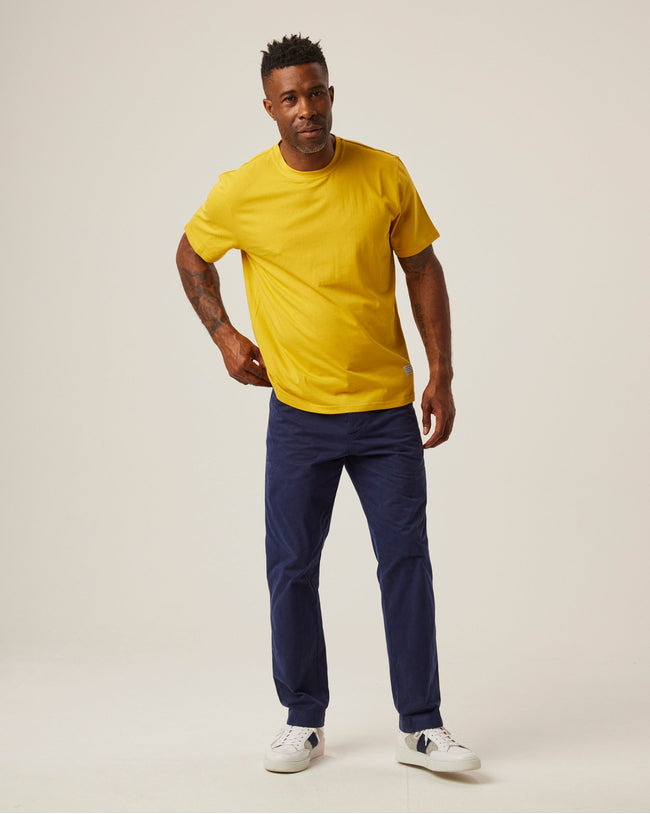 Image of model wearing Classic T-Shirt. Model is 6ft, chest size 36in and wearing size Medium