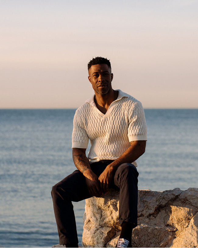 Image of model wearing Cove Polo Shirt.