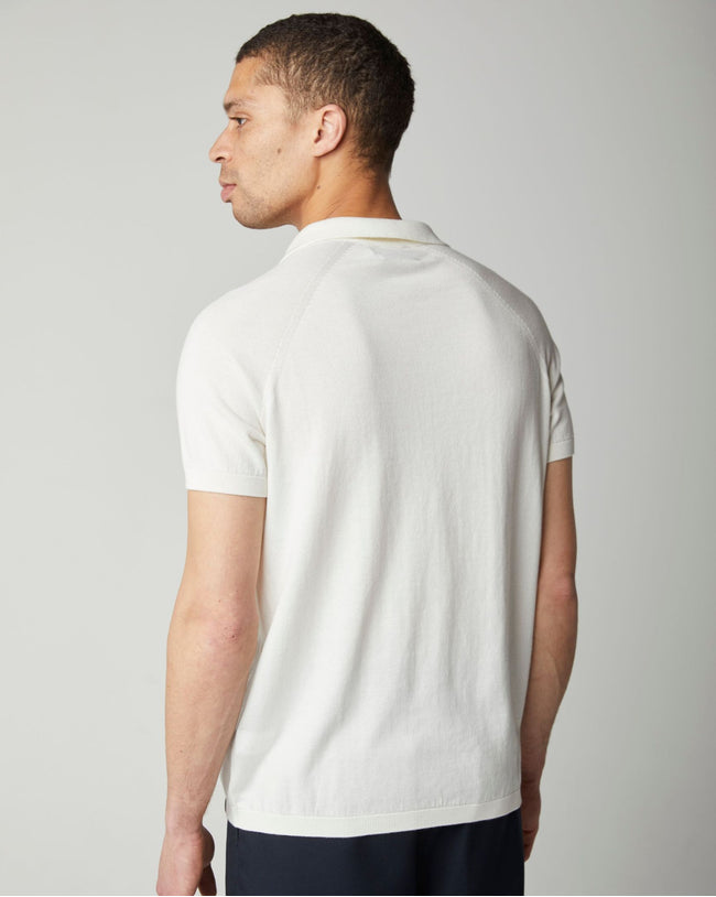 Image of model wearing Knitted Emery Polo Shirt. Model is 6ft, chest size 36in and wearing size Medium