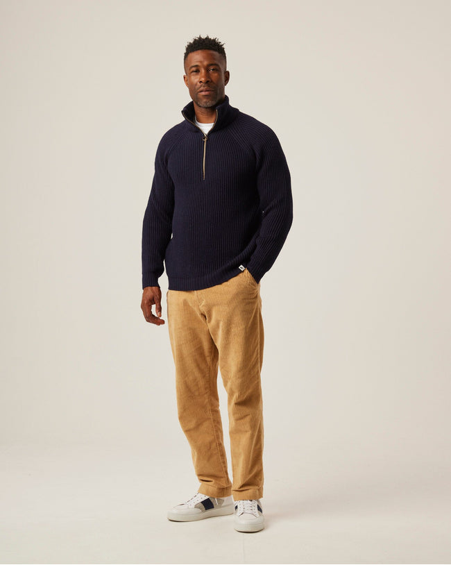 Image of model wearing Ford Zip Neck. Model is 6ft1in, chest size 38in and wearing size Medium