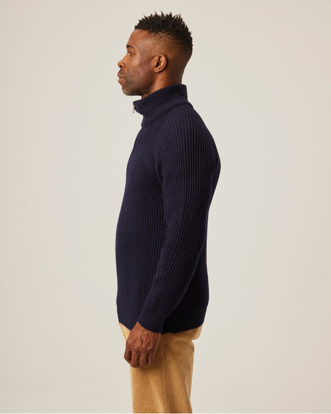 Image of model wearing Ford Zip Neck. Model is 6ft1in, chest size 38in and wearing size Medium
