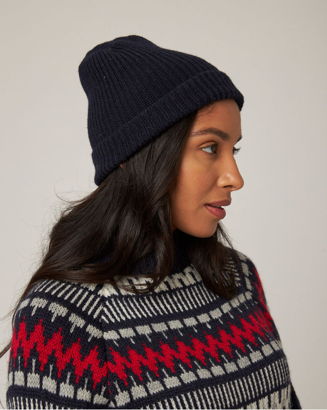 Image of model wearing Porter Ribbed Beanie. One Size