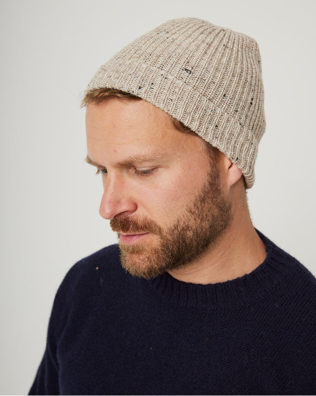 Image of model wearing Porter Ribbed Beanie. One Size