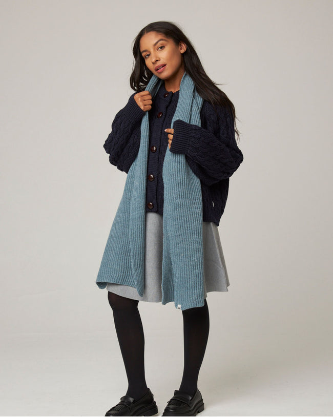 Image of model wearing Porter Ribbed Scarf. One Size