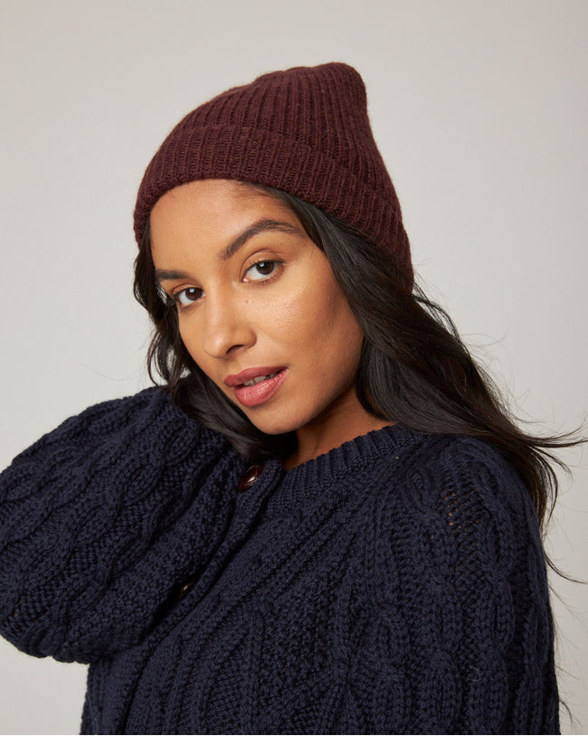 Image of model wearing Porter Ribbed Beanie. One Size