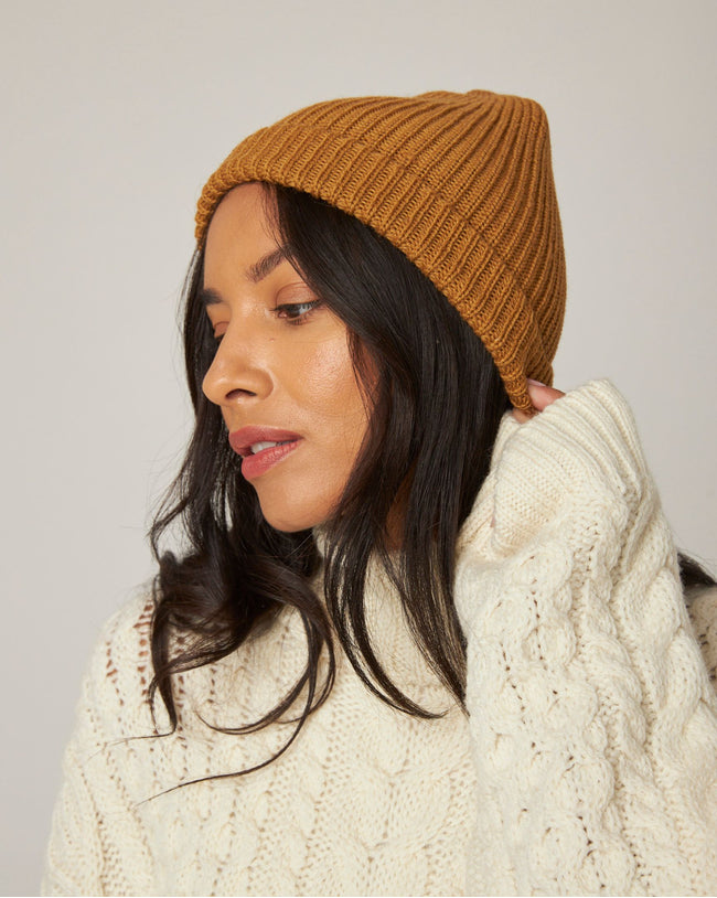 Image of model wearing Porter Ribbed Beanie. One Size