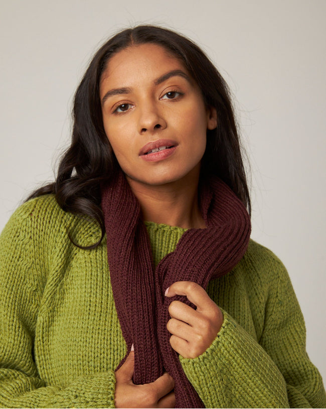 Image of model wearing Porter Ribbed Scarf. One Size