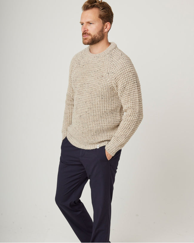 Image of model wearing Waffle Crew Neck Jumper. Model is 6ft1in, chest size 38in and wearing size Medium