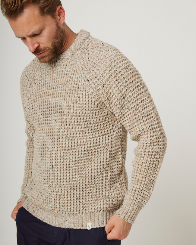 Image of model wearing Waffle Crew Neck Jumper. Model is 6ft1in, chest size 38in and wearing size Medium