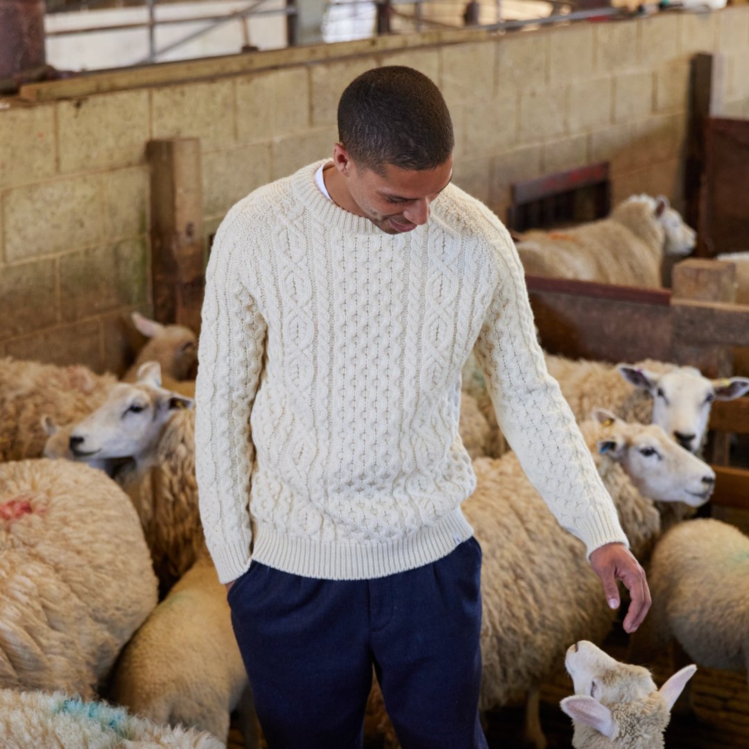 Man wearing the Ecru Hudson Aran Jumper