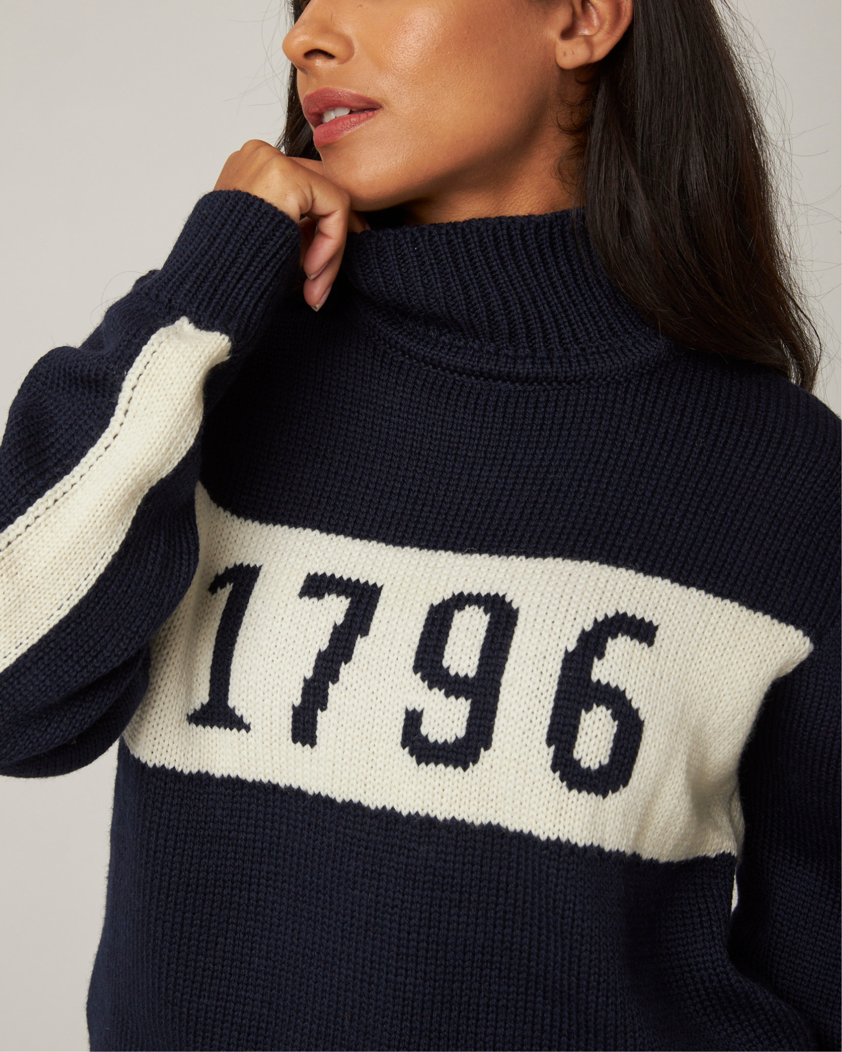 Image of model wearing 1796 Jumper. Model is 5ft8in, size UK 8 and wearing size Small