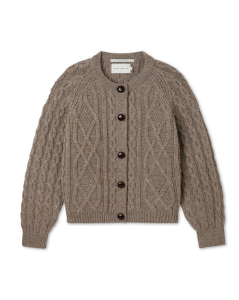 Image of model wearing Beckett Cable Knit Cardigan. 