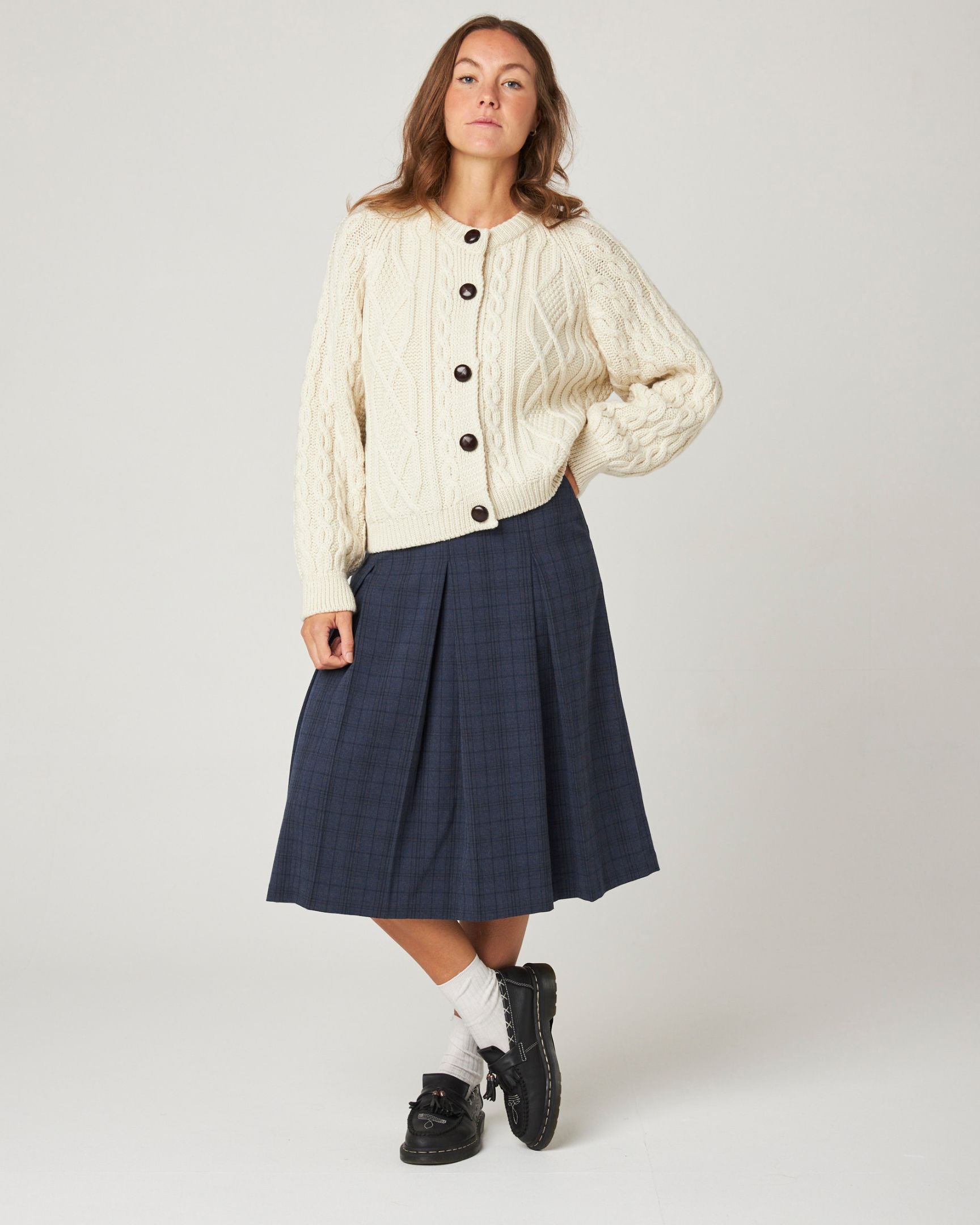 Image of model wearing Beckett Cable Knit Cardigan. 