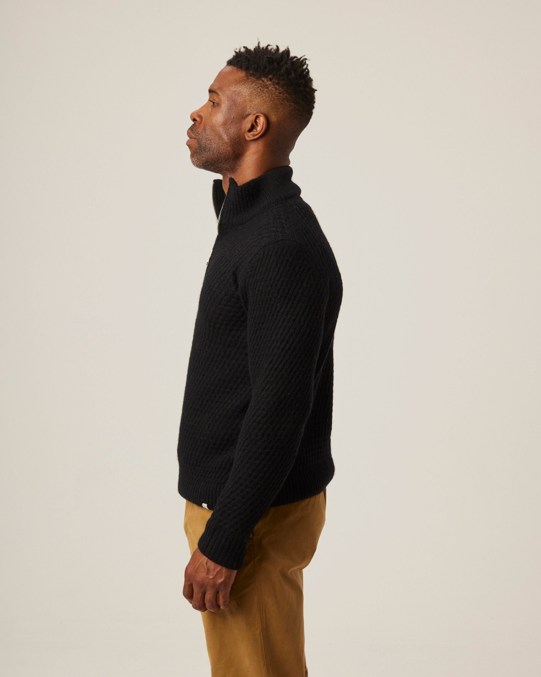 Image of model wearing Birchall Quarter Zip Jumper. 